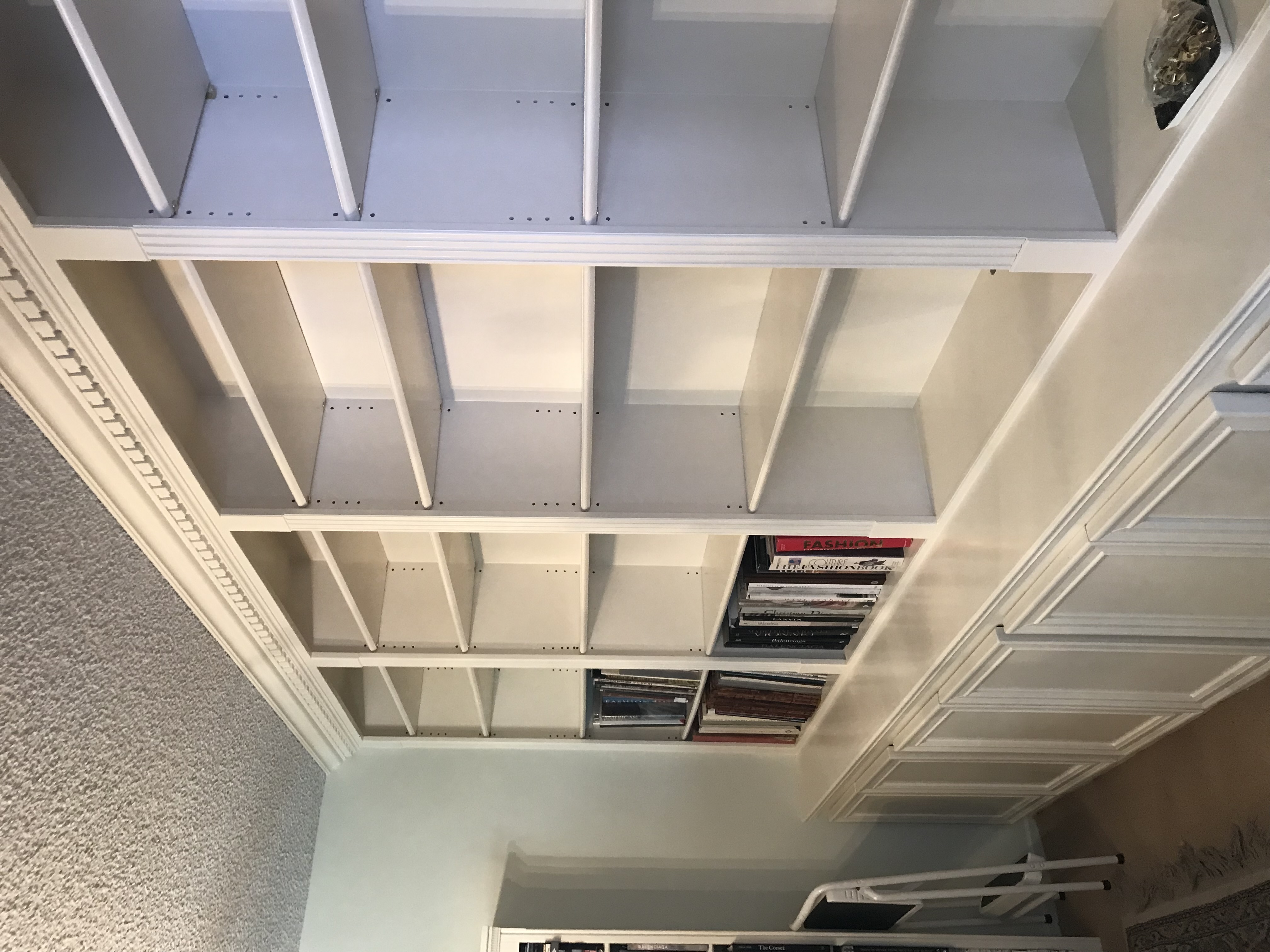 Custom built-in bookshelf with crown molding detail