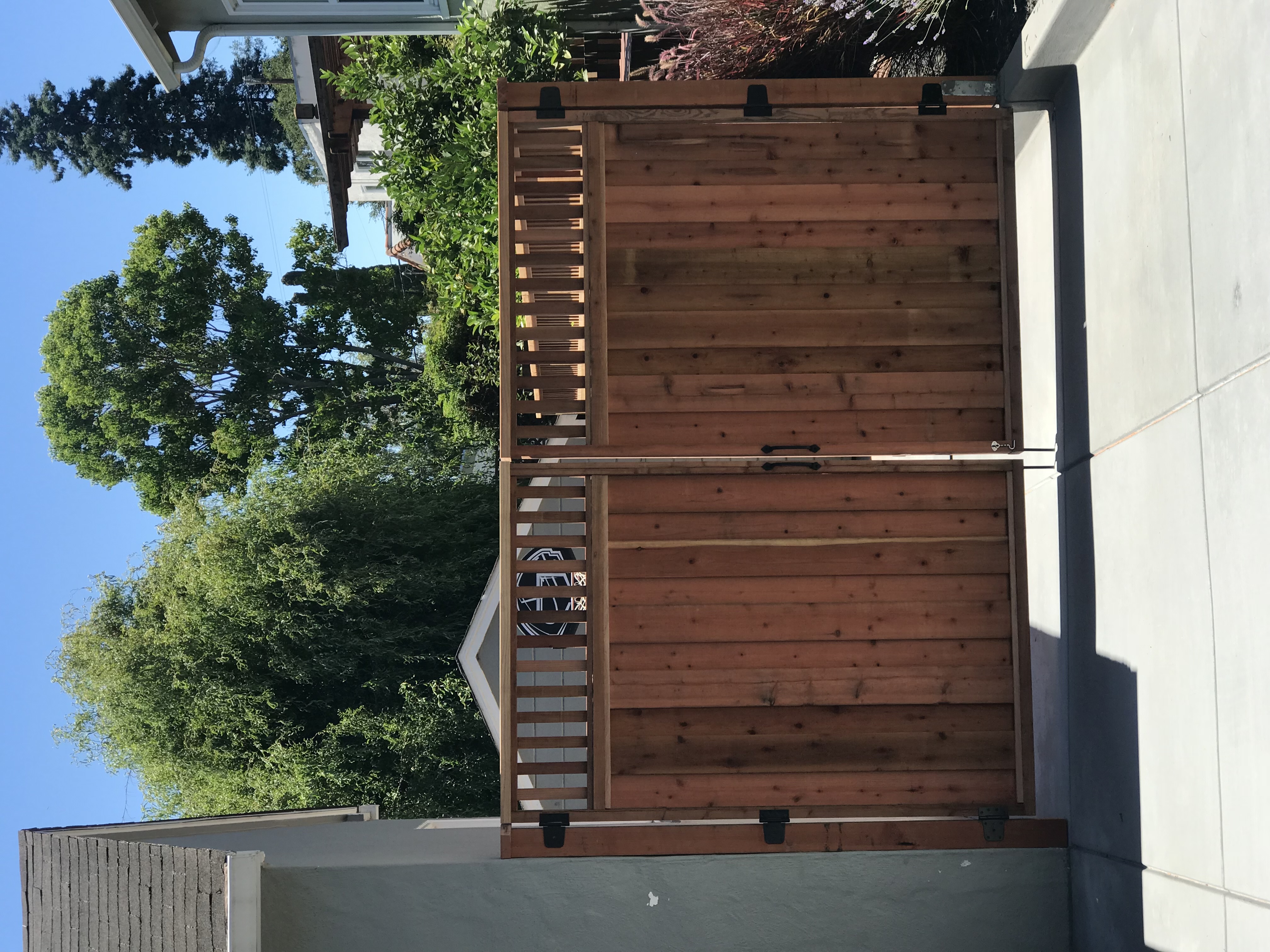 Custom privacy gate with louvered top detail