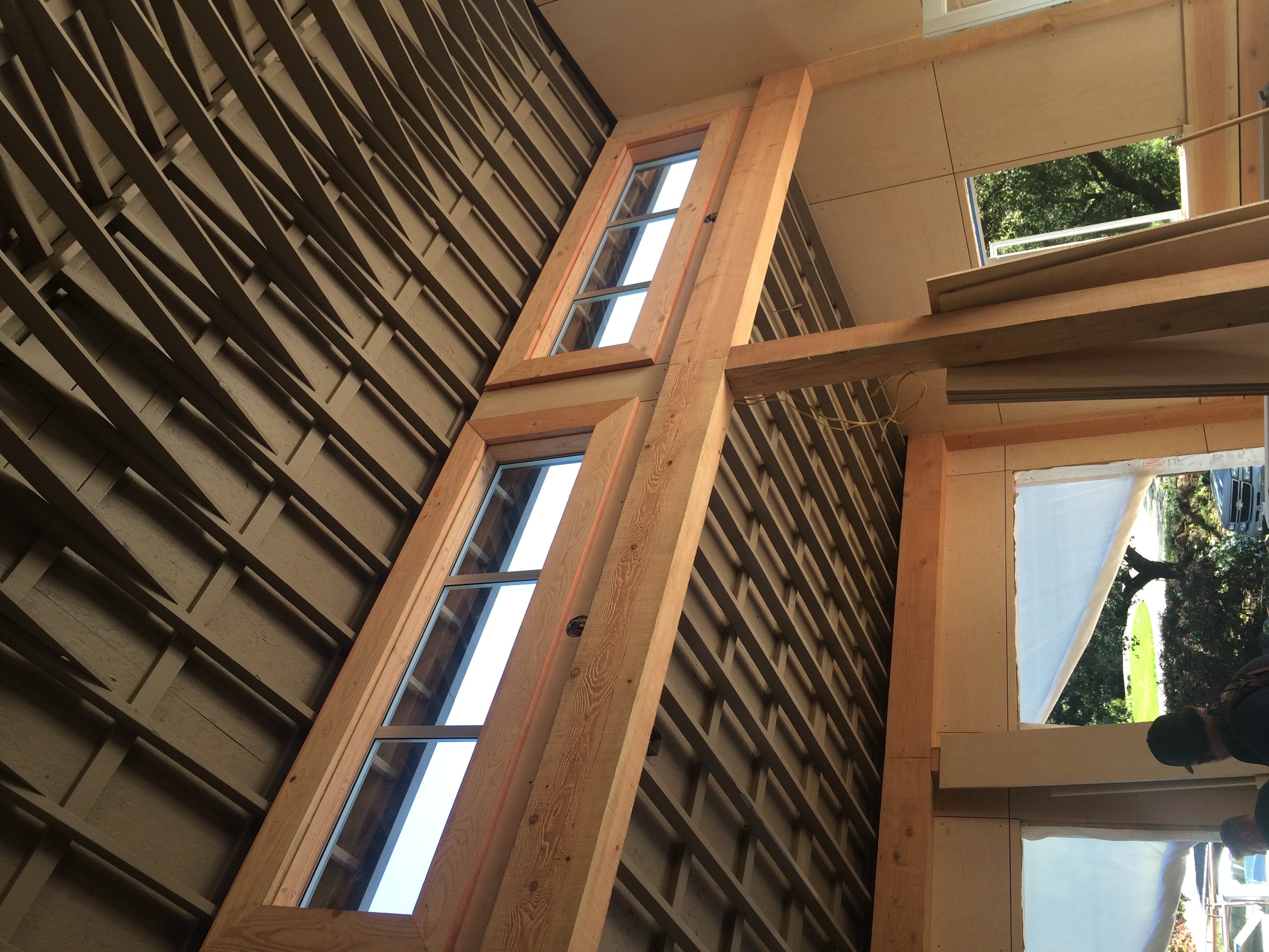 Custom window framing with timber post and beam detail